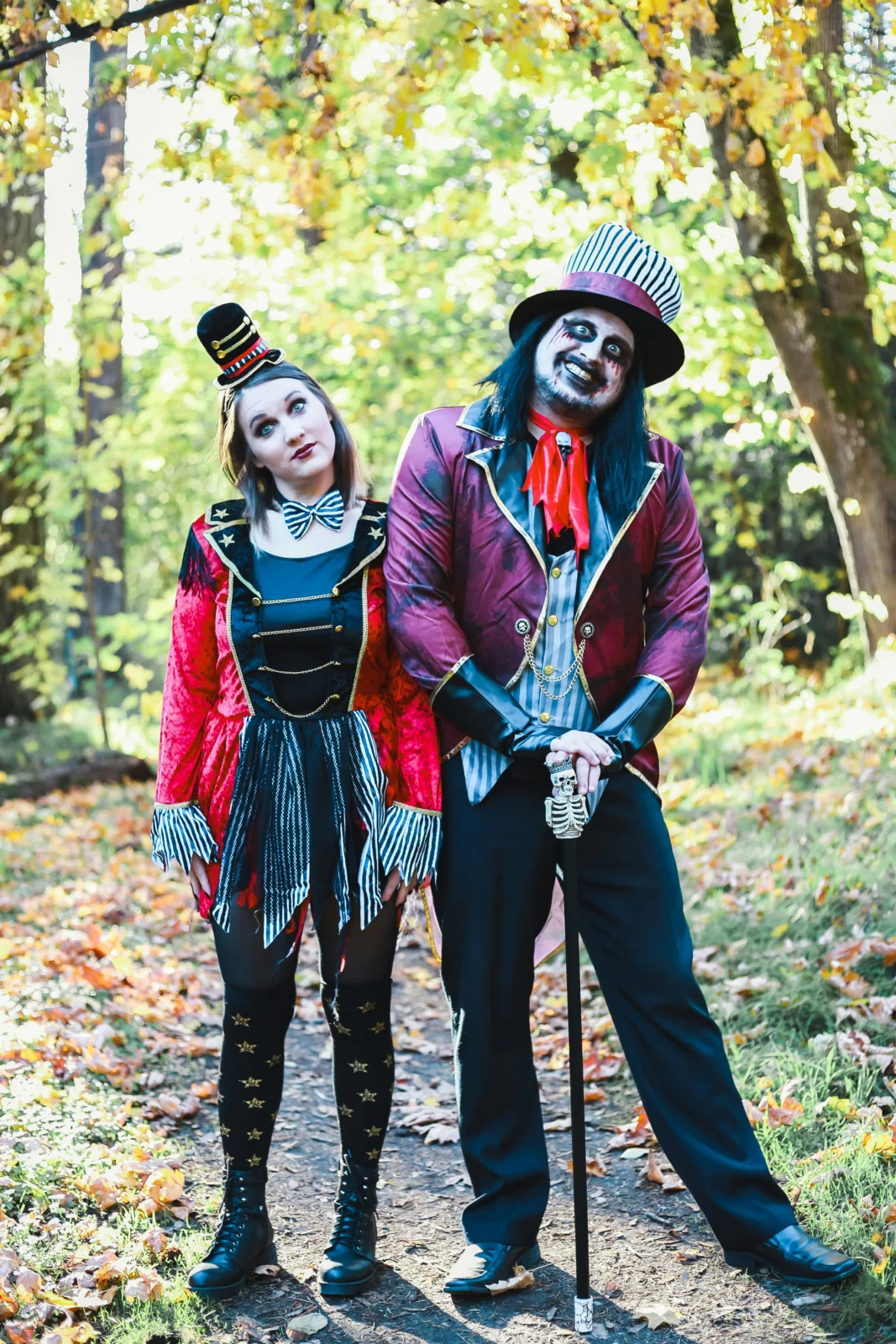 Couple comparing matching Halloween outfits while shopping for sexy themed costumes.