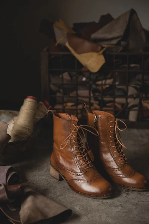 Retro fashion boots styled with a vintage-inspired outfit and accessories