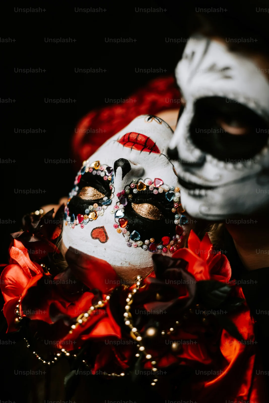 Person preparing creepy clown costumes and scary circus masks before a Halloween event